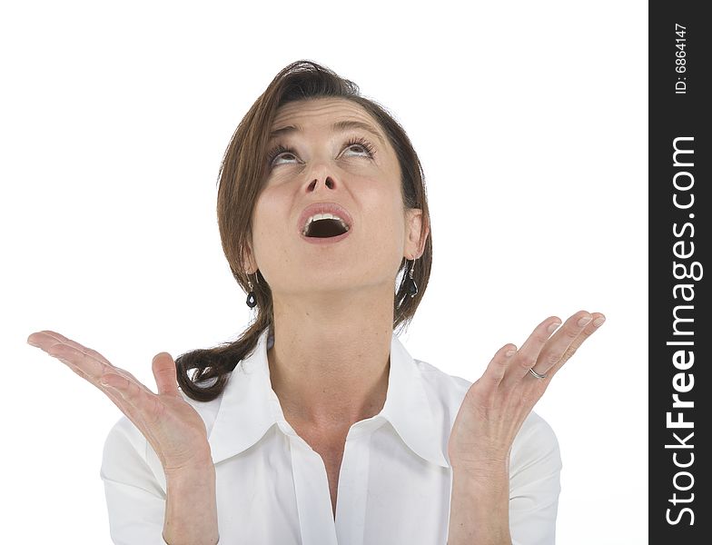 Portrait on white background of a forty years old woman in studio watching upside. Portrait on white background of a forty years old woman in studio watching upside