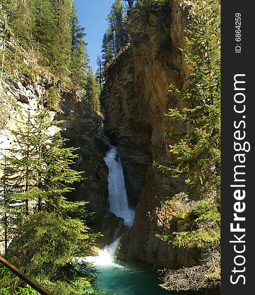 The lower falls at Johnston Canyon in Alberta Canada. The lower falls at Johnston Canyon in Alberta Canada.