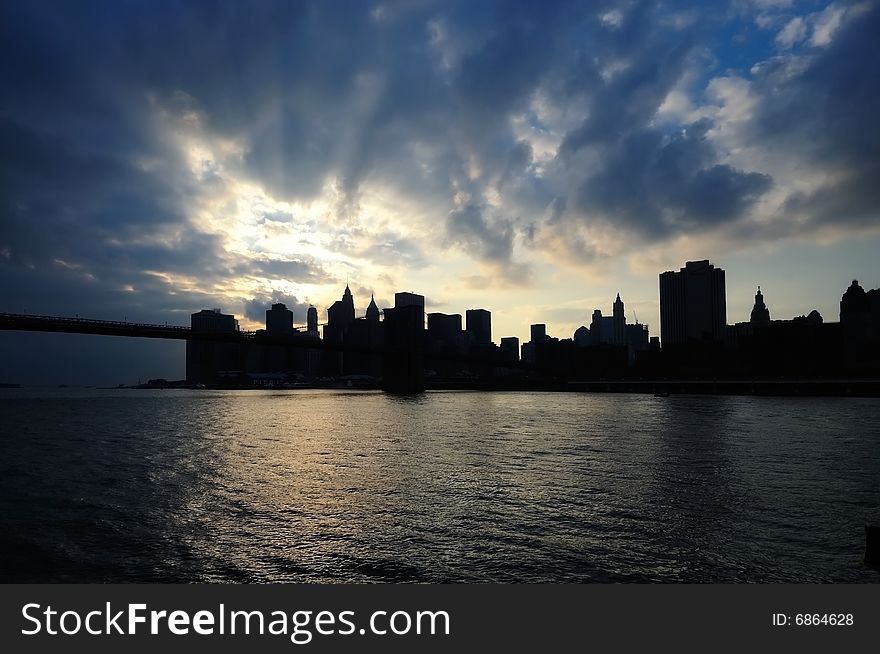 Silhouette of downtown Manhattan during Sunset. Silhouette of downtown Manhattan during Sunset