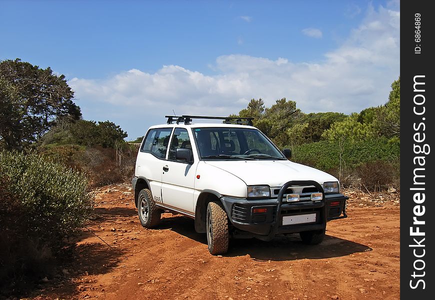 White 4x4 vehicle in the countryside