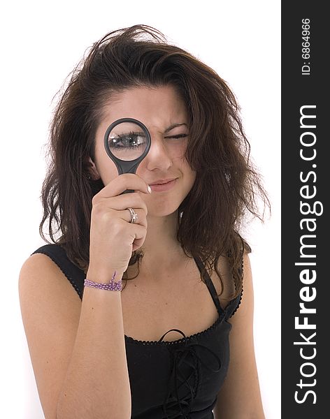 Girl looking at cam with magnifier