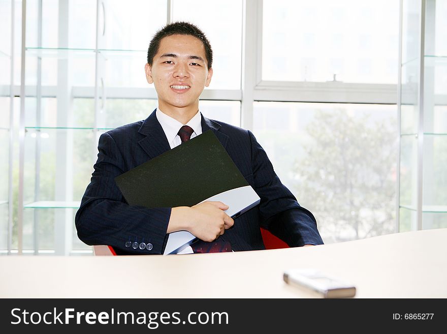 Young Asian Working In Office