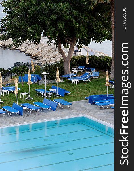 Lonely pool recliner overlooking the swimming pool.

Location: Limassol, Cyprus

(DSC_3940_DxO_raw)