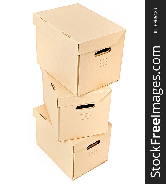 Pile of three cardboard boxes isolated on white. Pile of three cardboard boxes isolated on white