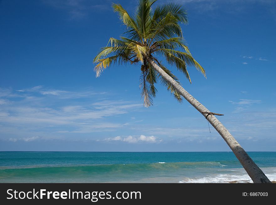 Beautiful scene at the beach, blue sky with white clouds, the place for relaxing. Beautiful scene at the beach, blue sky with white clouds, the place for relaxing