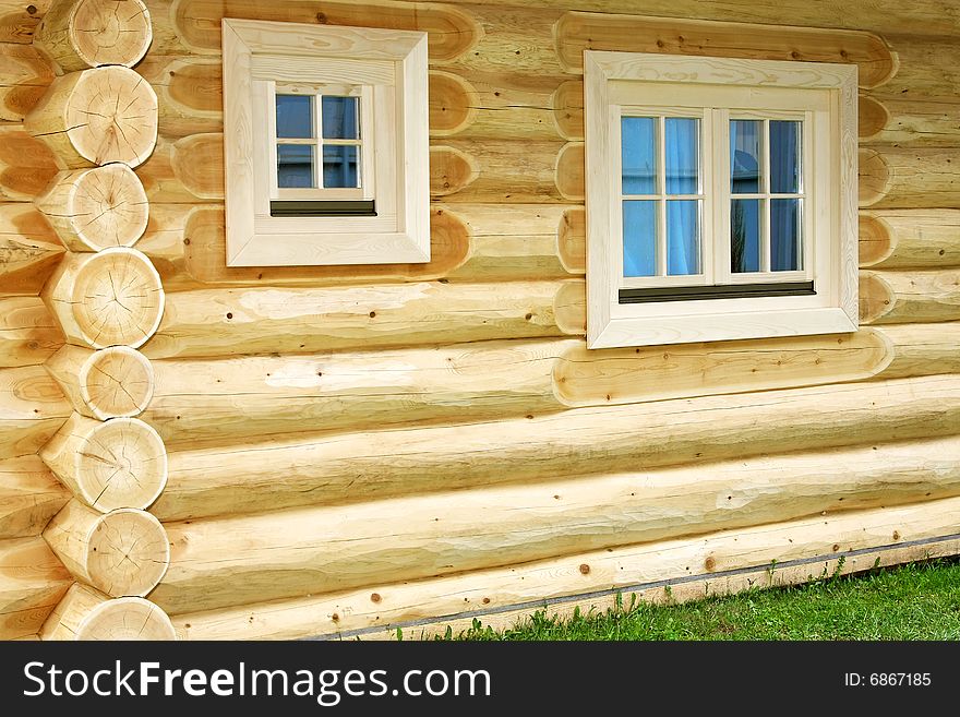 Country cottage house with pine balk wall