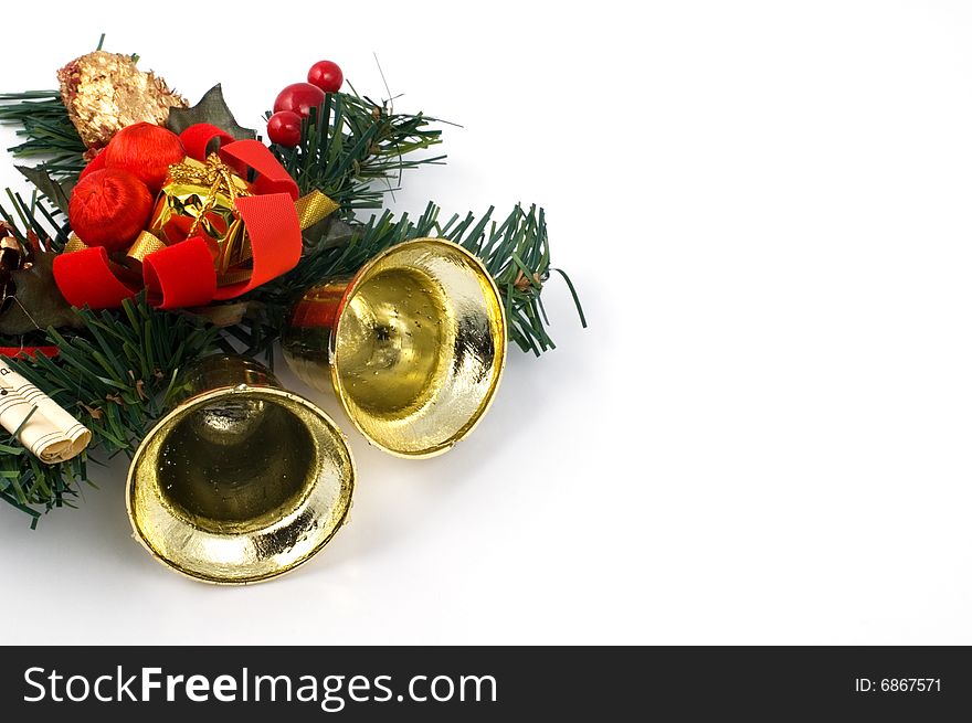 Christmas ornament with golden bells isolated on white. Copy space.