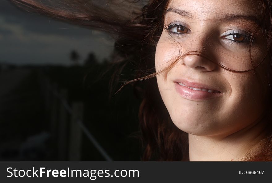 Woman smiling in windy weather
