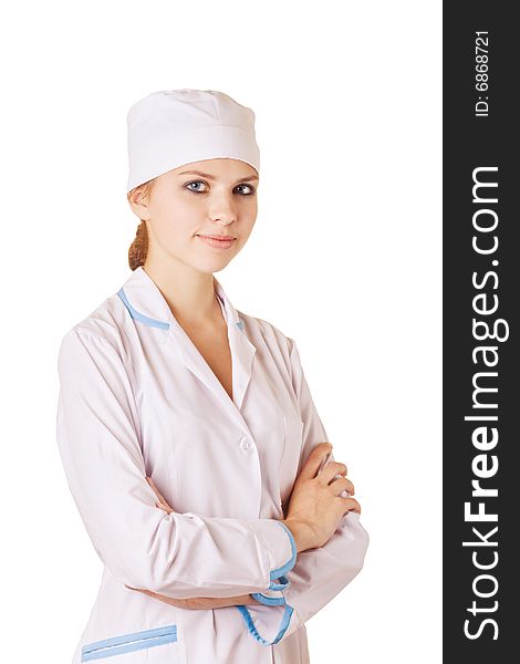 Beautiful young nurse standing on white background
