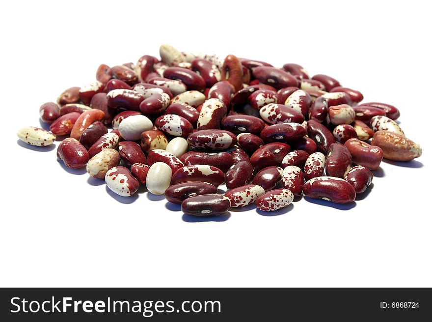 Kidney beans of diferent colors isolated on white