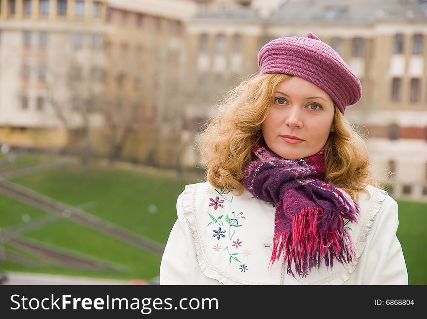 Middle age woman portrait in a city