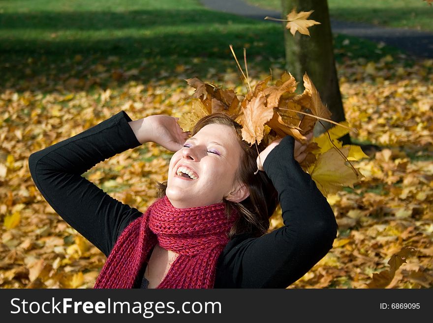 Happy woman relaxing in park. Happy woman relaxing in park