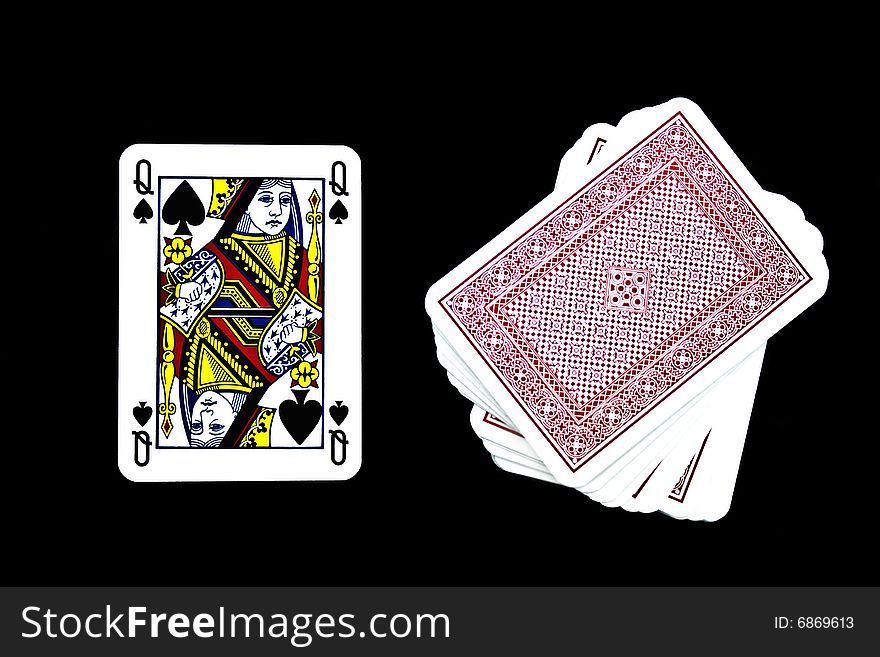 Playing cards on a black background