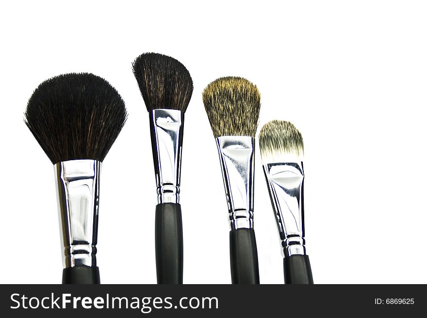 Cosmetic brushes isolated on a white background