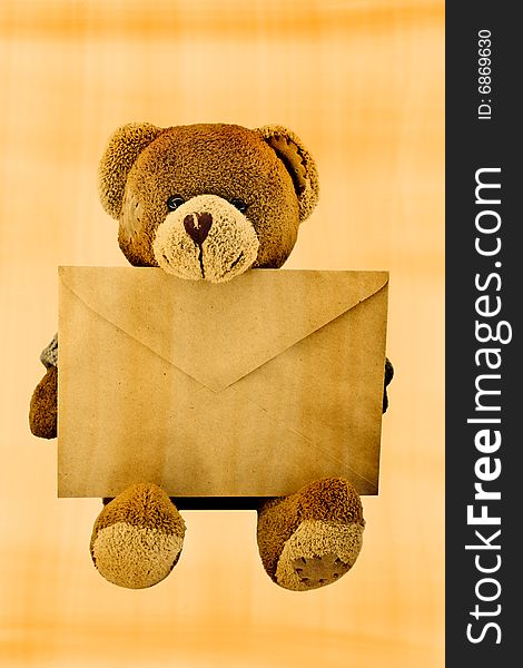 Teddy bear with an envelope