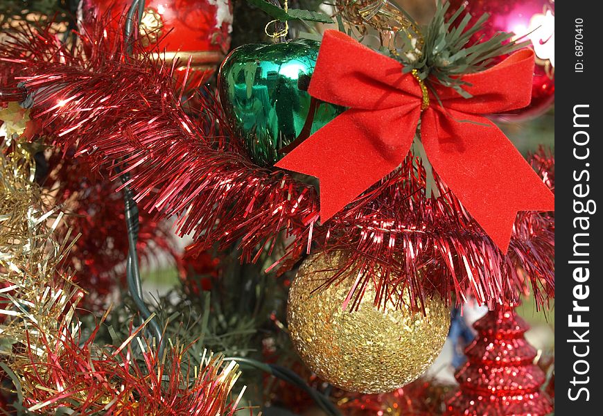 Christmas tree decorations: tinsel and baubles. Christmas tree decorations: tinsel and baubles