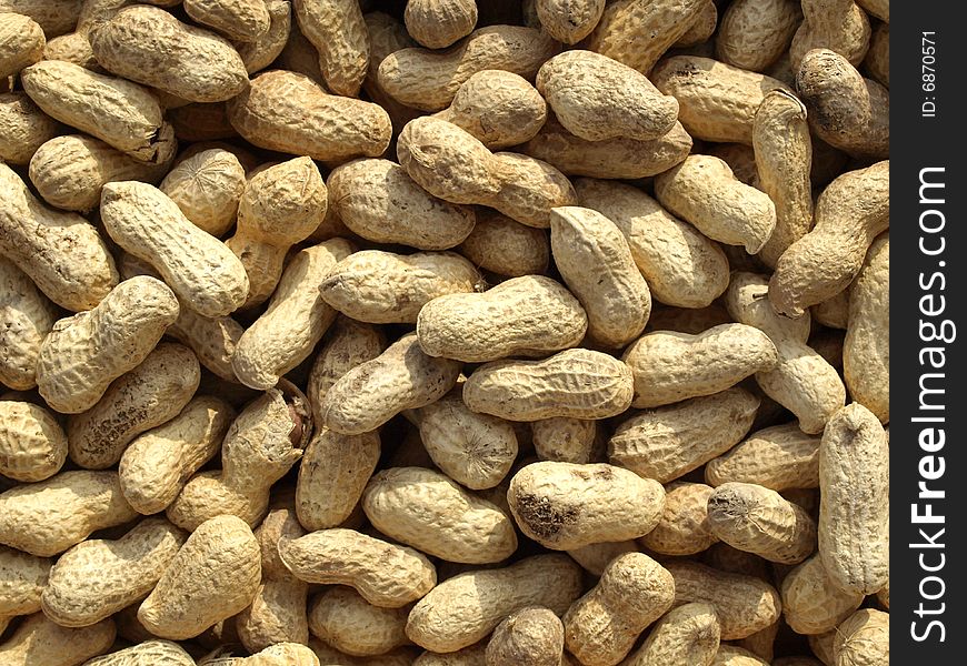 Dry roasted peanuts food background