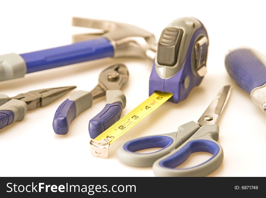 Tools focus on tape measure hammer background. Tools focus on tape measure hammer background