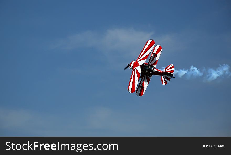 Acrobatic airplane in the sky