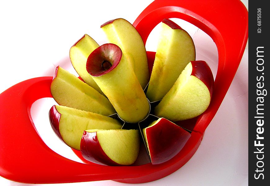 A Red Delicious apple after being cored and sliced. A Red Delicious apple after being cored and sliced