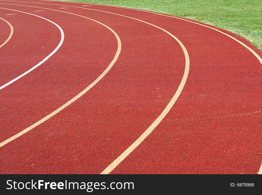 Red running track lanes image