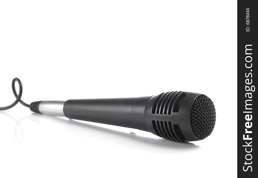 A black microphone isolated on white background.