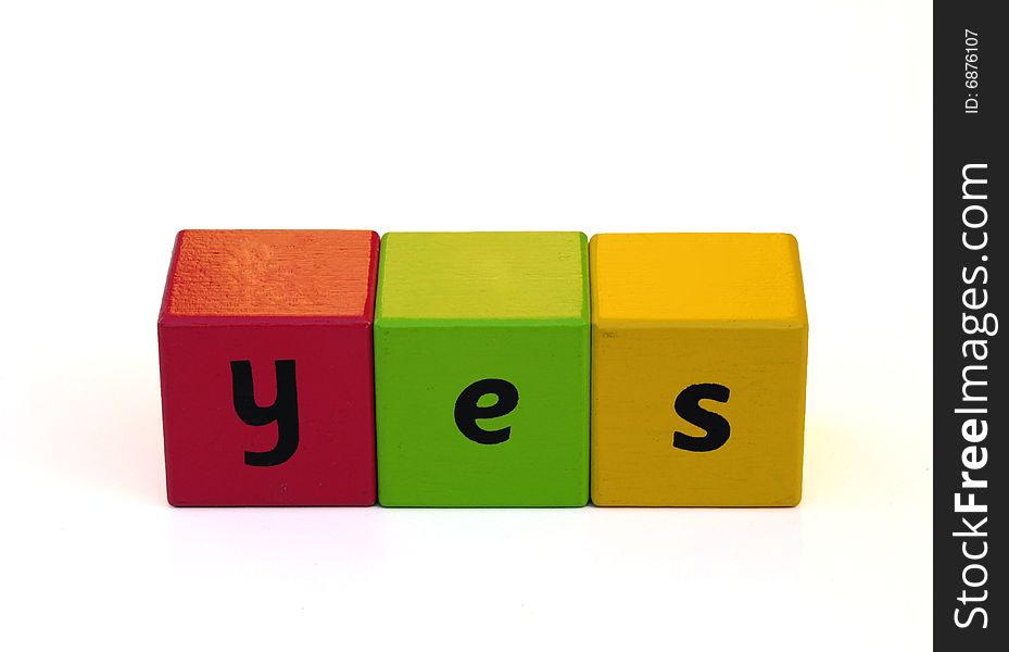 Shot of some toy bricks with the word yes spelled out on them