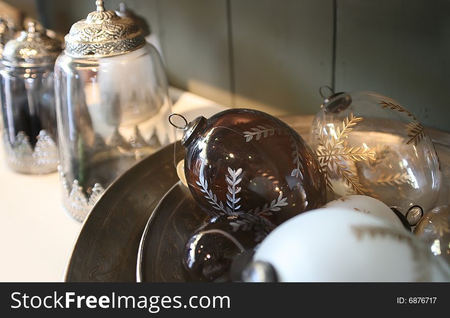 Winter balls  for home decoration on silver tray. Winter balls  for home decoration on silver tray