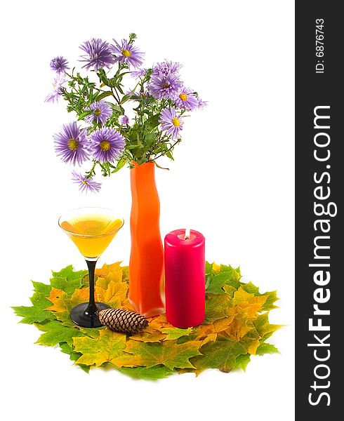 Bouquet of colors in orange decorative vase with autumn leaves on white background. Bouquet of colors in orange decorative vase with autumn leaves on white background