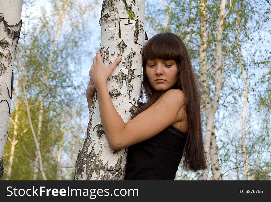 Beauty young girl hugging the birch. Beauty young girl hugging the birch