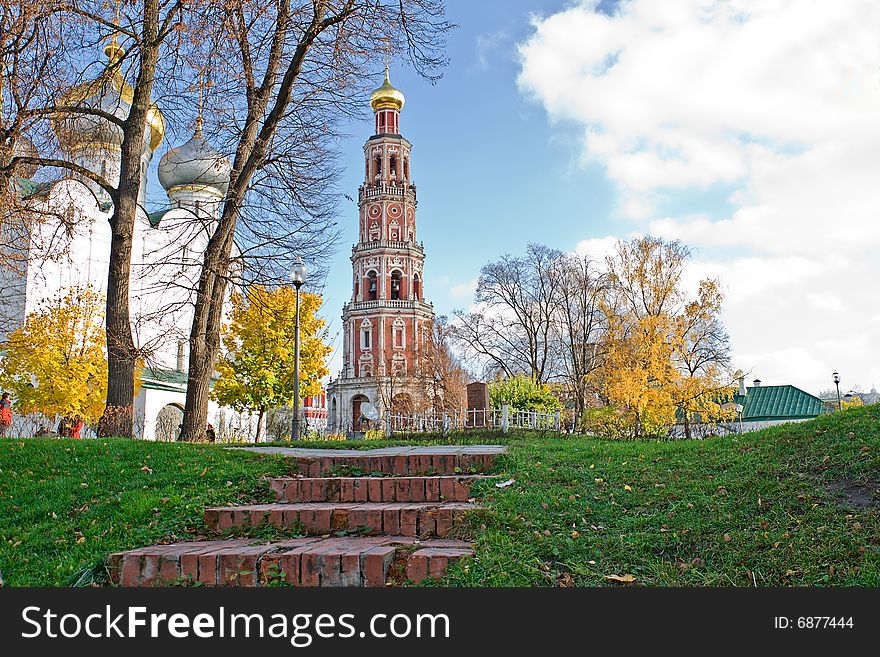 In the foreground a ladder which conducts to a belltower, on the right church. In the foreground a ladder which conducts to a belltower, on the right church