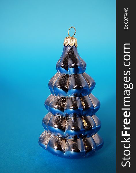 A christmas decoration with a blue tree