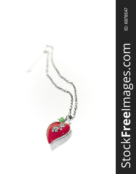 Red heart, pendant, lavaliere, silver, on white background. Red heart, pendant, lavaliere, silver, on white background