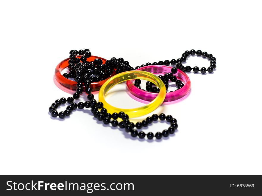 Three colour rings and black round necklace. Three colour rings and black round necklace