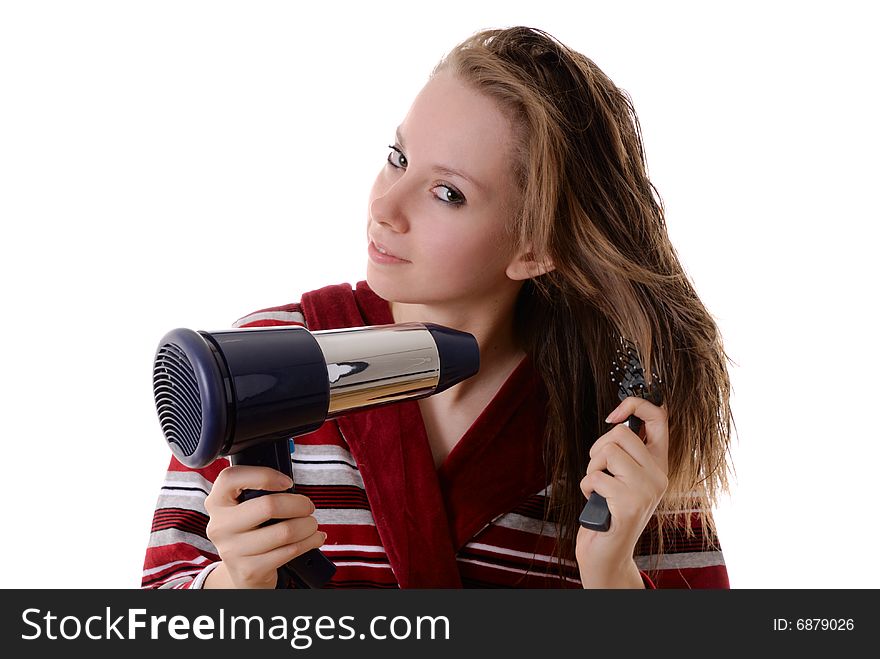 Attractive girl with a drier