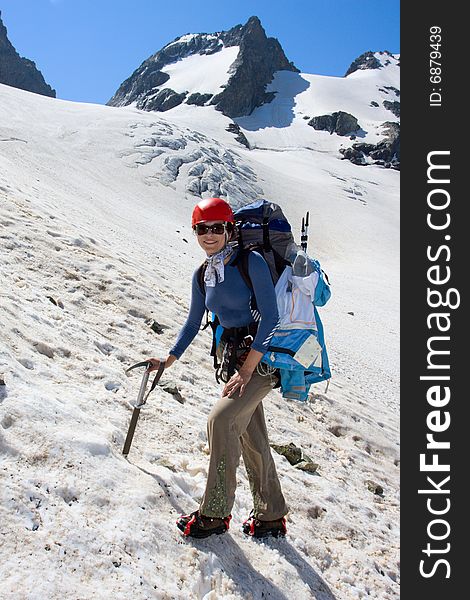 Backpacker Woman In Mountains