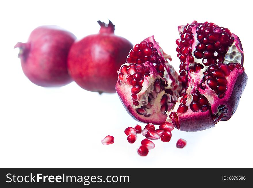 Fresh pomegranate, isolated on white background
