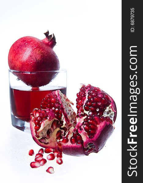 Pomegranate fruits and juice