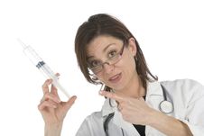 Doctor Holding A Big Syringe Royalty Free Stock Photography Doctor Holding A Big Syringe Royalty Free Stock Photography