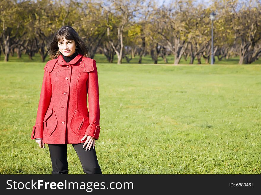 Young Woman In The Autumn Park. Young Woman In The Autumn Park