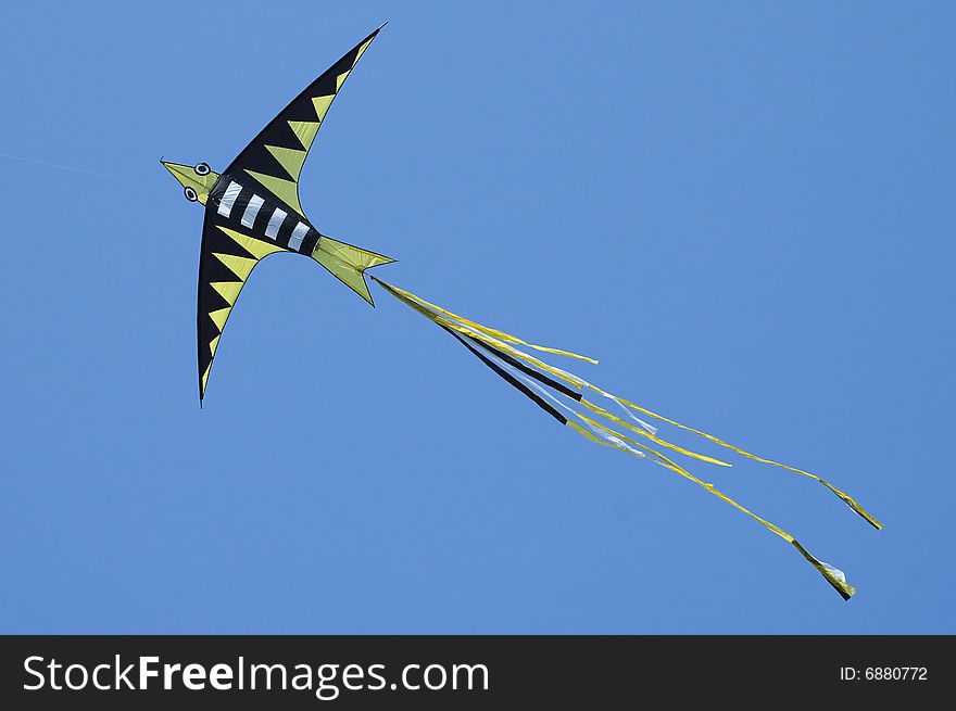 Original kite in the blue sky