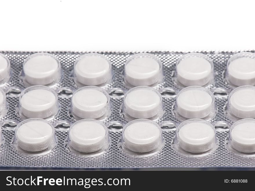 Packs of vitamins on the white isolated background