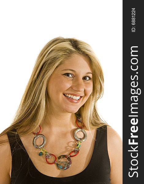 A blonde in black dress and colorful necklace with great smile. A blonde in black dress and colorful necklace with great smile