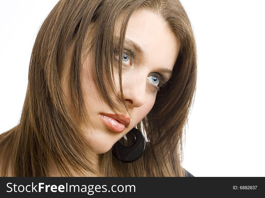 Closeup portrait of an attractive girl with black earrings on white background. Closeup portrait of an attractive girl with black earrings on white background