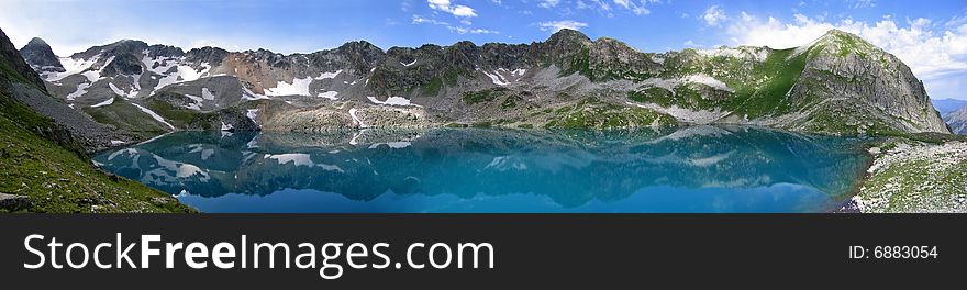 Blue Lake - one of two lakes in the Murundzhu valley, North Caucasus Mountains, Russia. Blue Lake - one of two lakes in the Murundzhu valley, North Caucasus Mountains, Russia