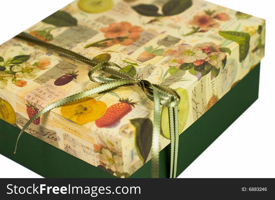 Closeup of green gift box with bow