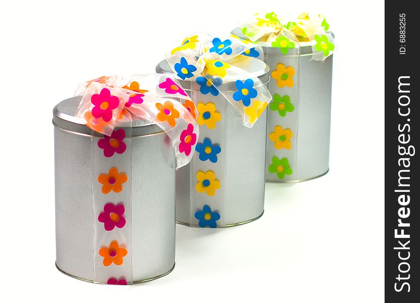 Tree beautiful metal gift boxes with colorful bows