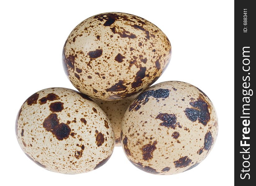 Four quail eggs in pyramid