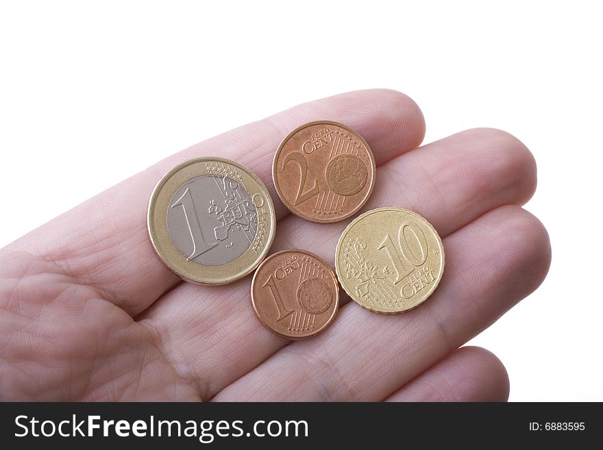 Euro coins on finger tips, with white background. Euro coins on finger tips, with white background.