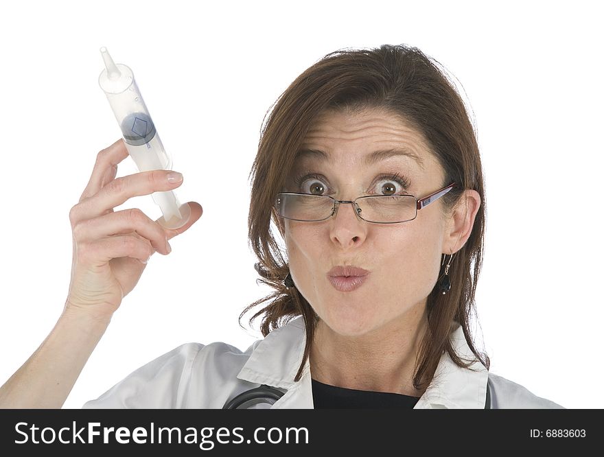 Doctor holding a big syringe